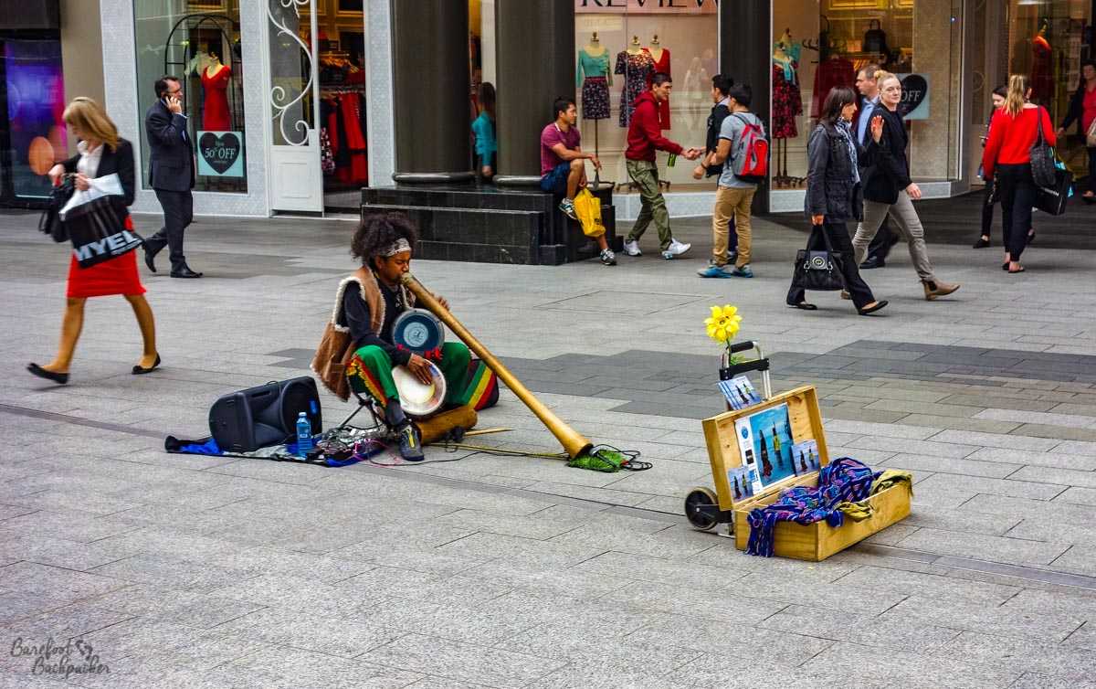 Man playing music on the street in Adelaide.