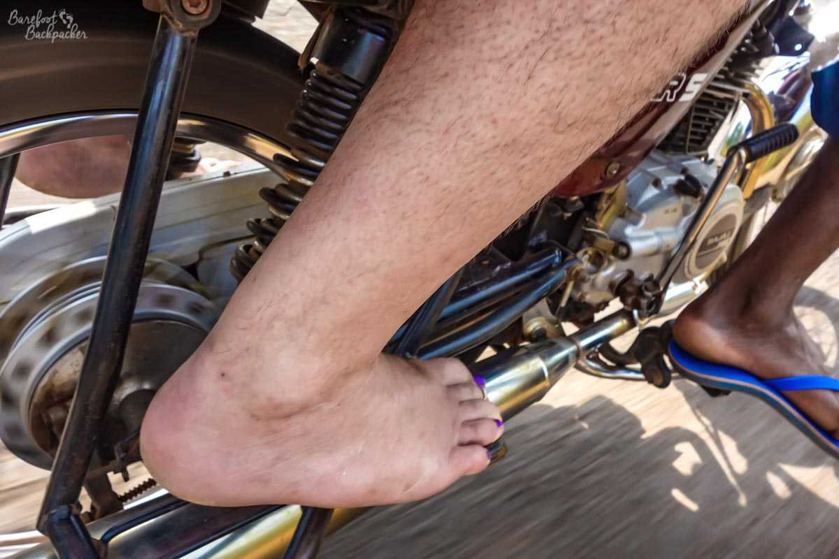 Barefoot on a motorbike in Benin.