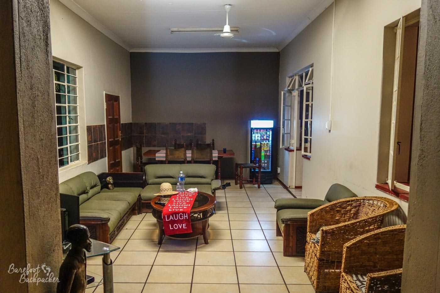 The main lounge of the hostel/B&B in Musina; sort of the missing link between homespun and student-functional.