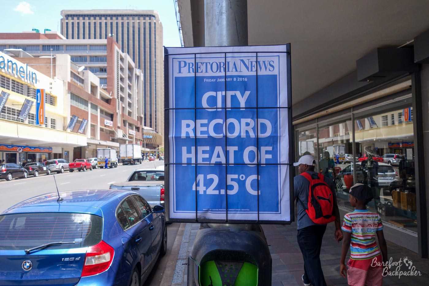 Poster in Pretoria highlighting the weather – 42°C!.