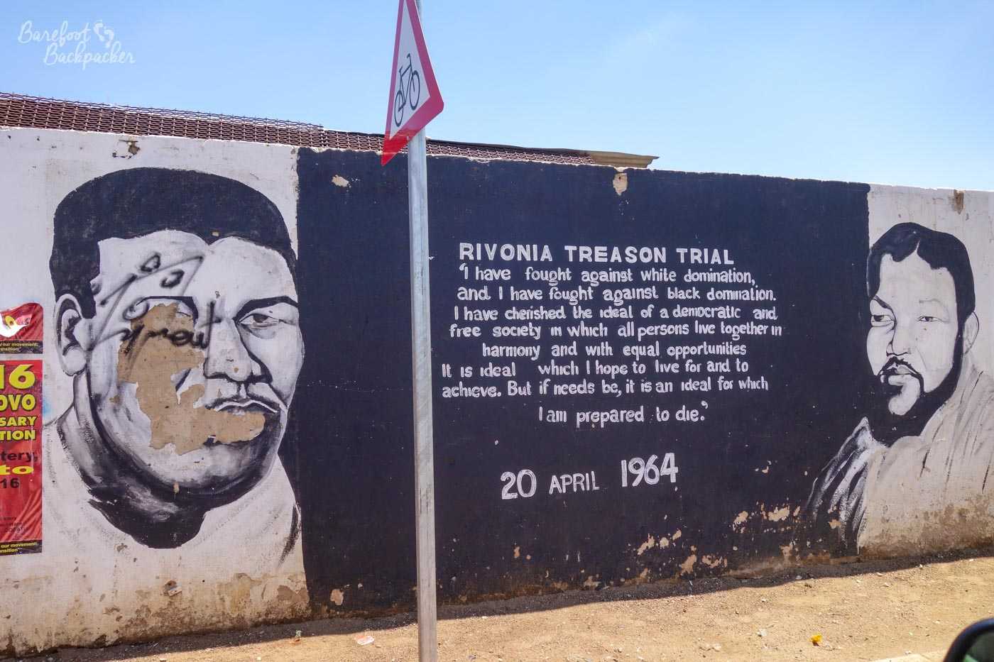 Extract from a speech by Nelson Mandela at his trial, prior to imprisonment in 1964, which in summary says 'I am prepared to die for the cause of an equal and free South Africa'. It's painted on a wall in Soweto.