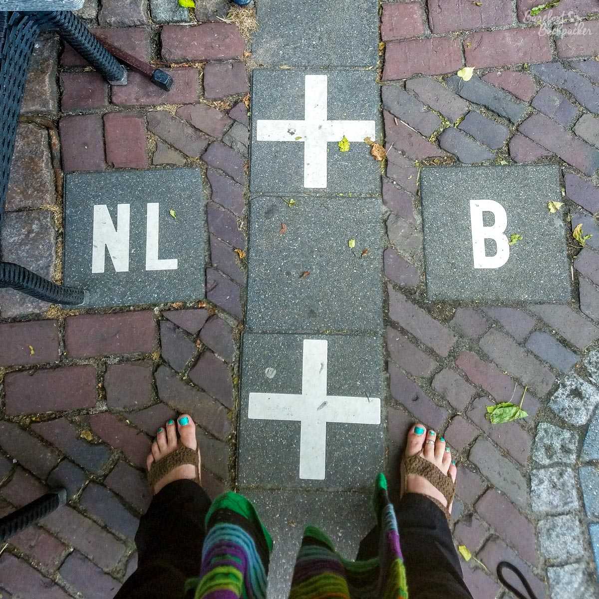 Stood astride the Dutch/Belgian border in Baarle-Hertog/Baarle-Nassau, one (bare) foot in each country. The quirky borders here were why it was on my Bucket List.
