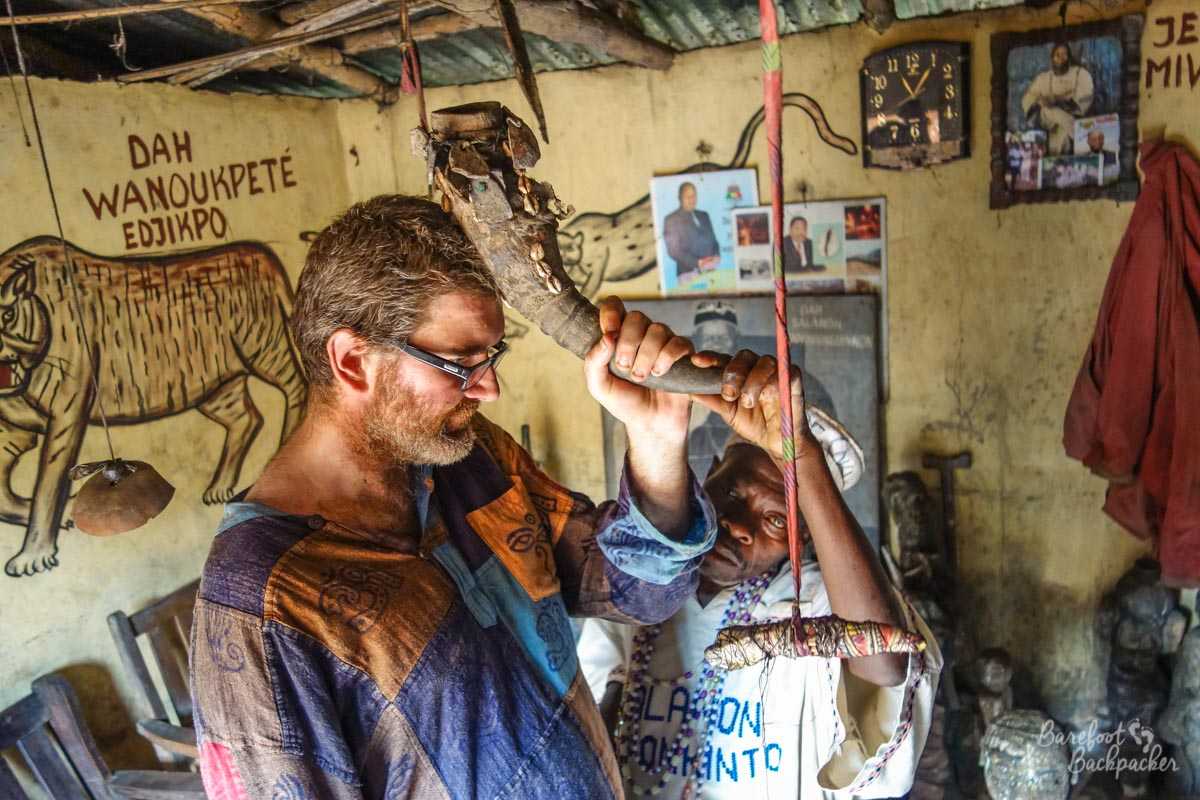 The Barefoot Backpacker taking part in a Voodoo ceremony in Abomey, Benin.