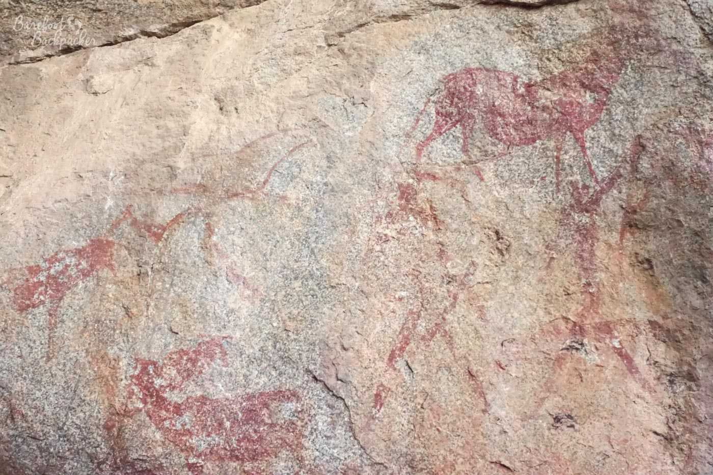 Cave paintings in the Matapos Hills; red lines on the cave sides.