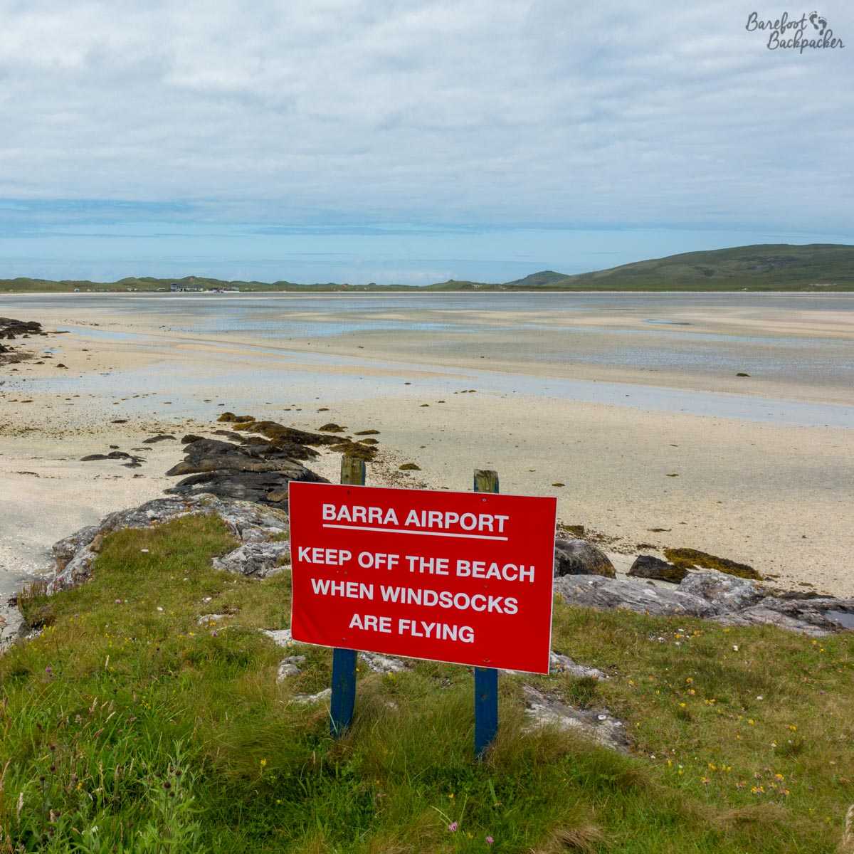 The sign at Barra Airport warning people to stay off the beach, er, runway