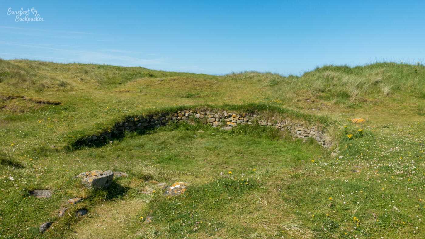 View of the foundations of one of the round houses at Cladh Hallan, South Uist