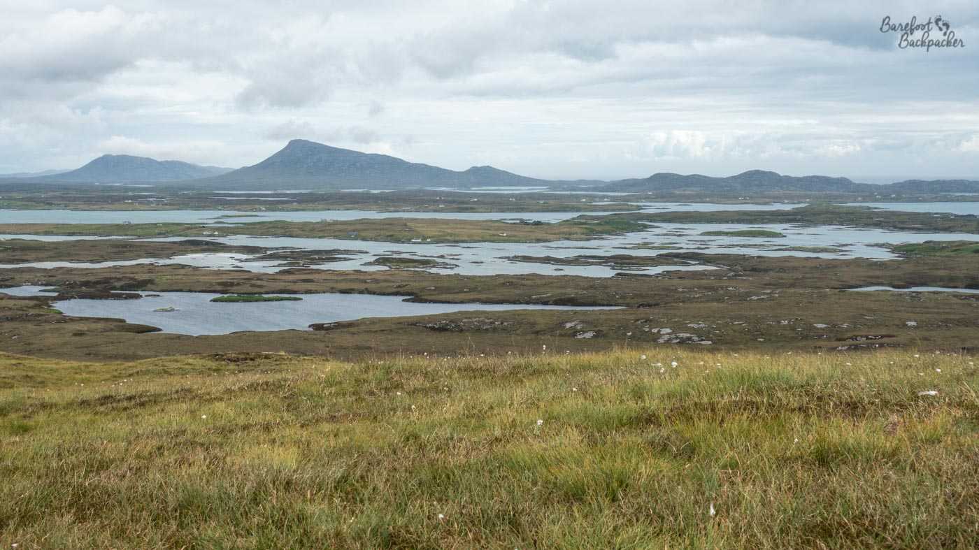 Looking out over the floodplains, presumably of the islands between Benbecula and North Uist, from Ruabhal hill