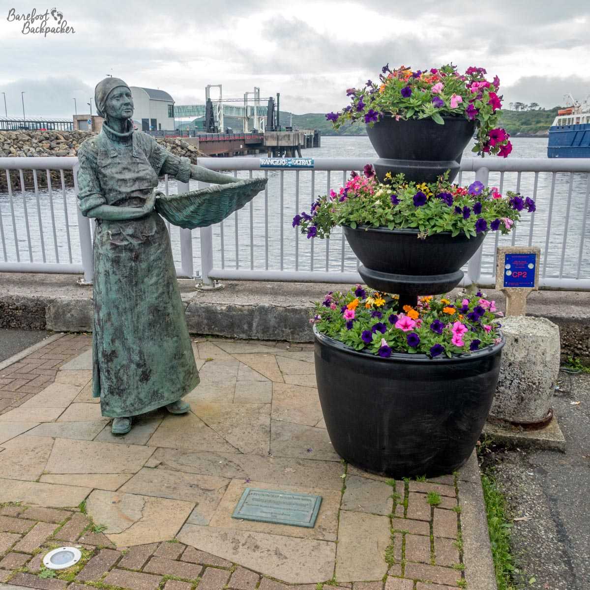 Statue of one of the Herring Girls, at Stornoway Harbour