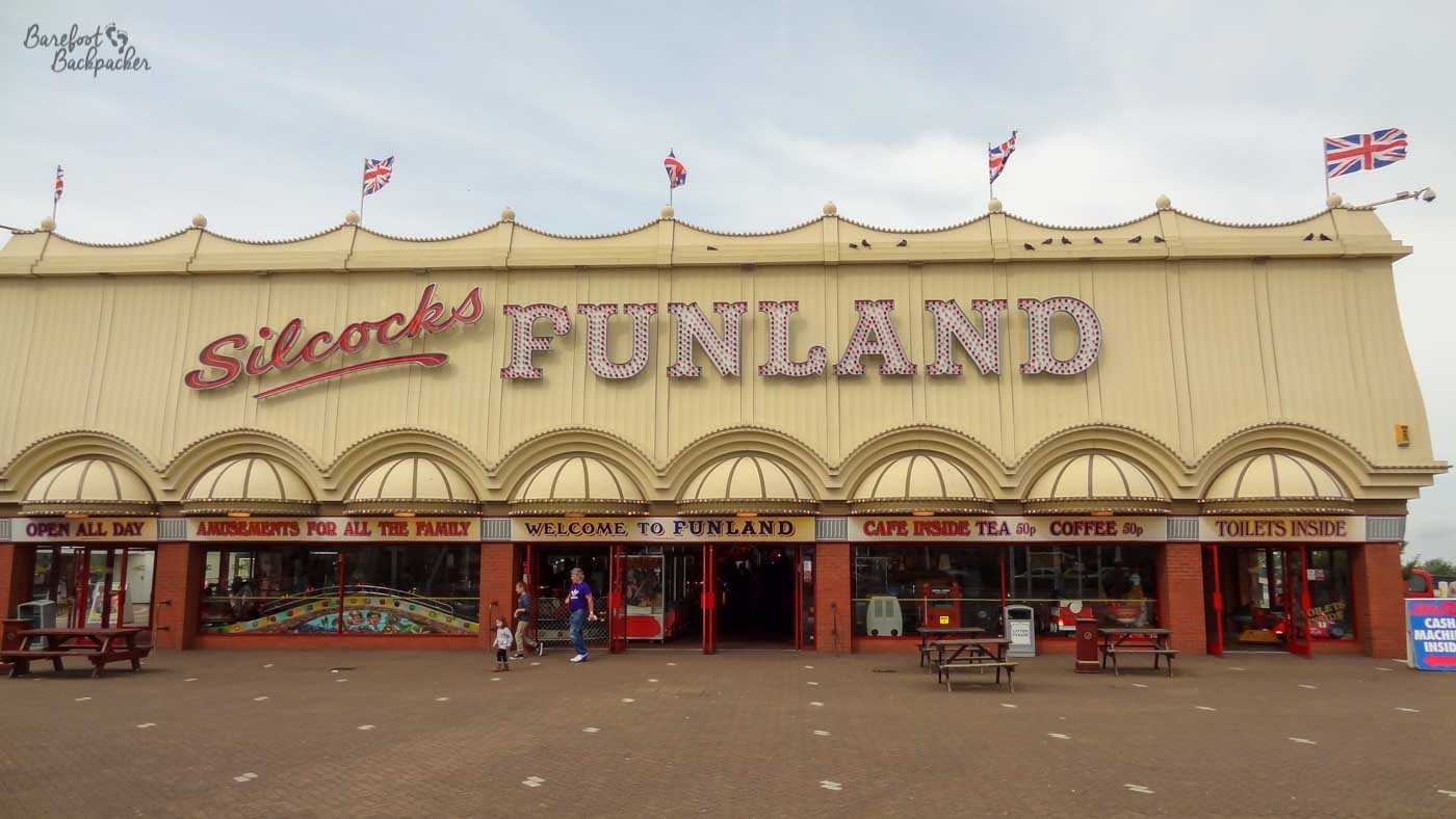 Southport Funland Amusement Arcade – a Victorian-looking building with a marquee-like roof. Open All Day. Amusements for all the family. There are benches outside to snack at.